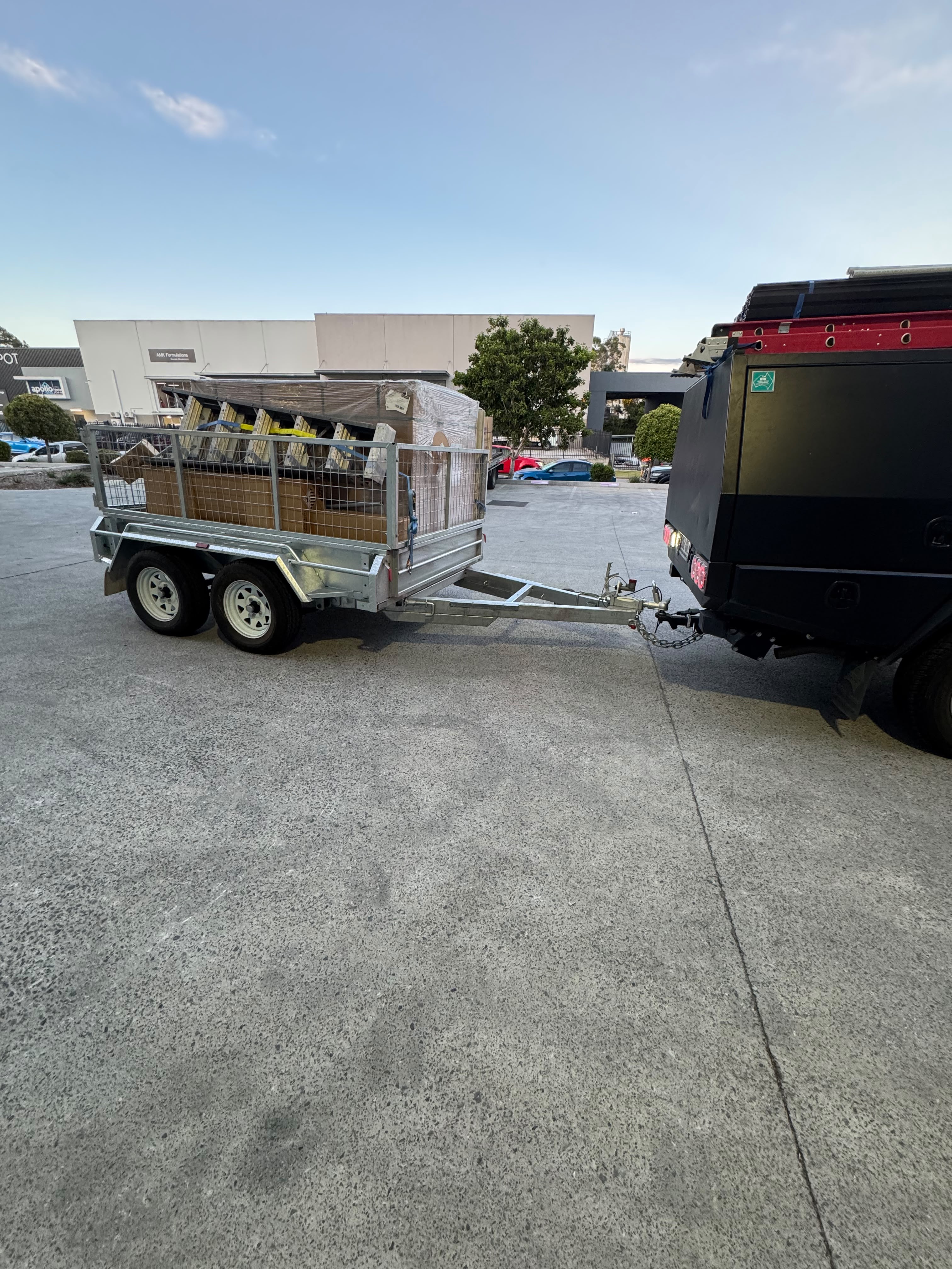 Gold Coast solar battery delivery ute trailer panels ladders Untapped Energy