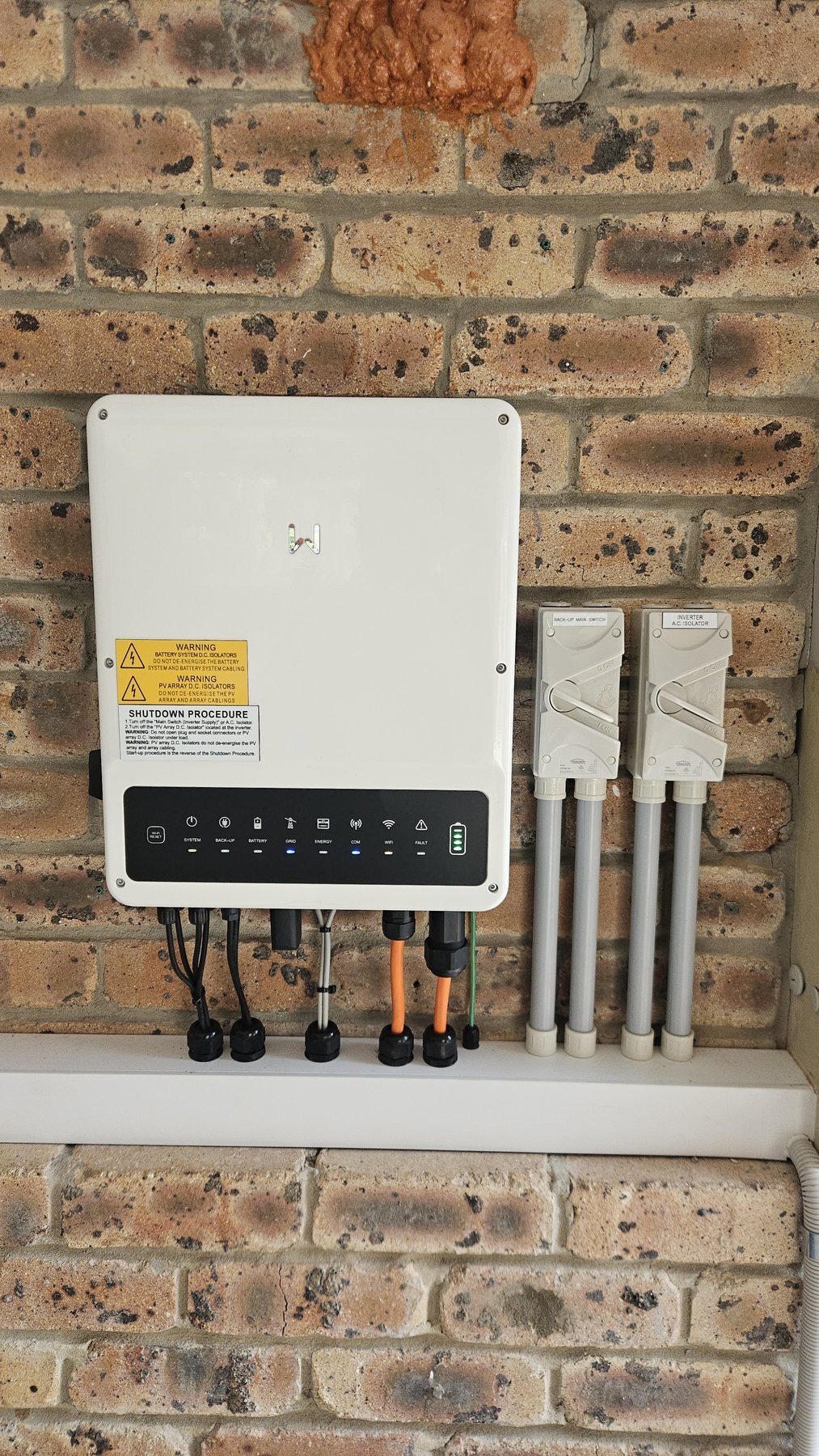 GoodWe hybrid inverter install Gold Coast brick wall